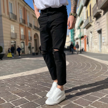 Jeans nero strappo al ginocchio - FLAG STORE